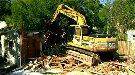 tearing down house with mini excavator|mini excavator demolition.